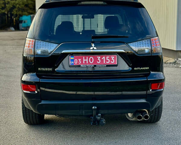 Мицубиси Аутлендер 2012 в Полтаве на Automoto.ua Черный Мицубиси Аутлендер, объемом двигателя 2.3 л и пробегом 194 тыс. км за 11450 $, фото 3 на Automoto.ua