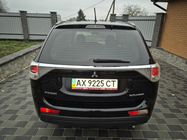 Черный Мицубиси Аутлендер, объемом двигателя 2.4 л и пробегом 211 тыс. км за 12590 $, фото 7 на Automoto.ua