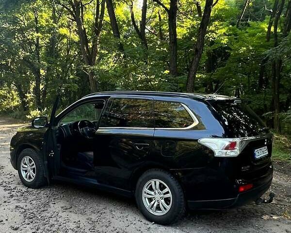 Чорний Міцубісі Аутлендер, об'ємом двигуна 2.27 л та пробігом 250 тис. км за 12200 $, фото 22 на Automoto.ua