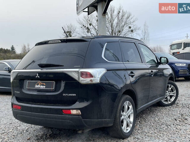 Чорний Міцубісі Аутлендер, об'ємом двигуна 2.27 л та пробігом 203 тис. км за 12600 $, фото 7 на Automoto.ua