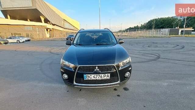 Черный Мицубиси Аутлендер, объемом двигателя 2.36 л и пробегом 285 тыс. км за 11300 $, фото 25 на Automoto.ua