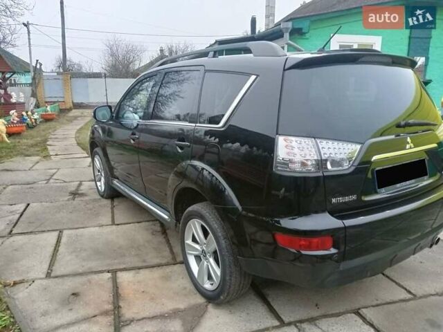 Черный Мицубиси Аутлендер, объемом двигателя 2.2 л и пробегом 218 тыс. км за 11500 $, фото 5 на Automoto.ua