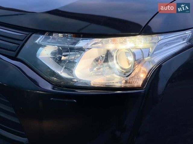 Черный Мицубиси Аутлендер, объемом двигателя 2.36 л и пробегом 212 тыс. км за 12990 $, фото 15 на Automoto.ua