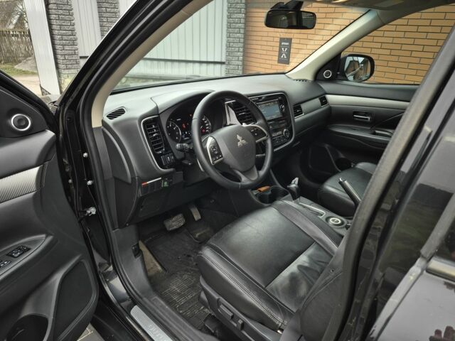 Черный Мицубиси Аутлендер, объемом двигателя 2.4 л и пробегом 211 тыс. км за 12590 $, фото 12 на Automoto.ua