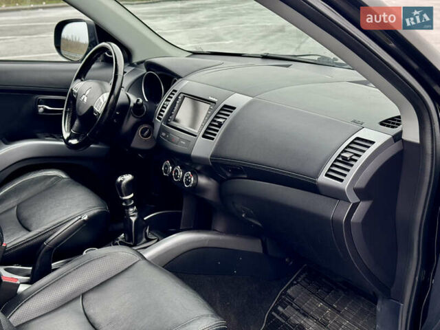 Черный Мицубиси Аутлендер, объемом двигателя 2.2 л и пробегом 215 тыс. км за 11450 $, фото 26 на Automoto.ua