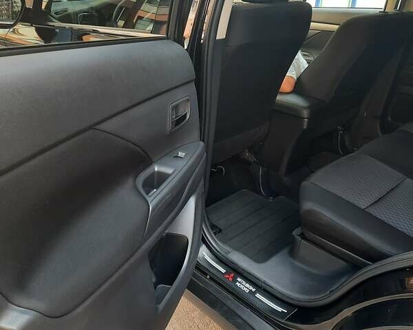 Черный Мицубиси Аутлендер, объемом двигателя 2.27 л и пробегом 256 тыс. км за 13600 $, фото 10 на Automoto.ua