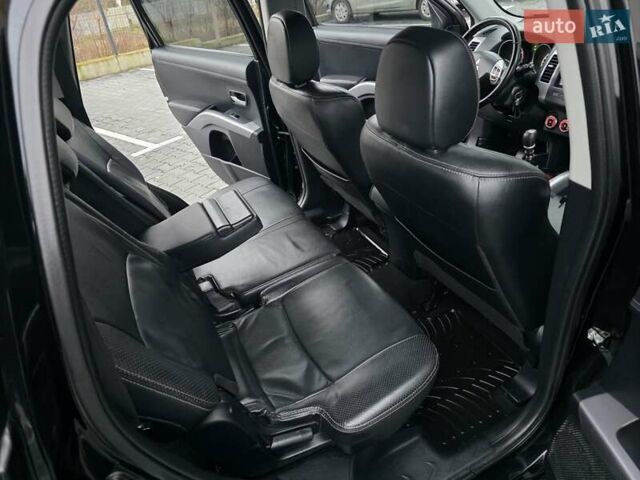 Черный Мицубиси Аутлендер, объемом двигателя 2.2 л и пробегом 188 тыс. км за 10999 $, фото 36 на Automoto.ua