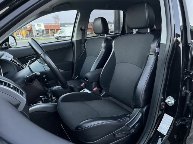 Черный Мицубиси Аутлендер, объемом двигателя 2.3 л и пробегом 124 тыс. км за 11999 $, фото 13 на Automoto.ua