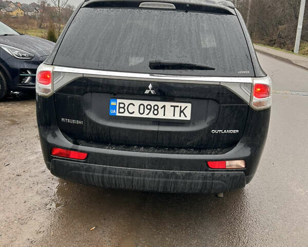 Черный Мицубиси Аутлендер, объемом двигателя 2.27 л и пробегом 202 тыс. км за 13100 $, фото 3 на Automoto.ua