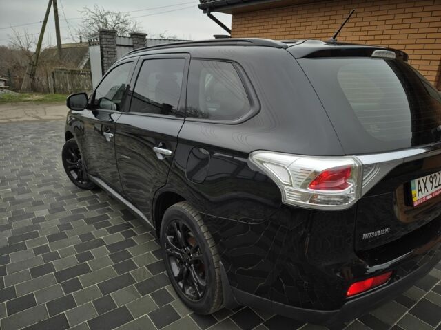 Черный Мицубиси Аутлендер, объемом двигателя 2.4 л и пробегом 211 тыс. км за 12590 $, фото 8 на Automoto.ua