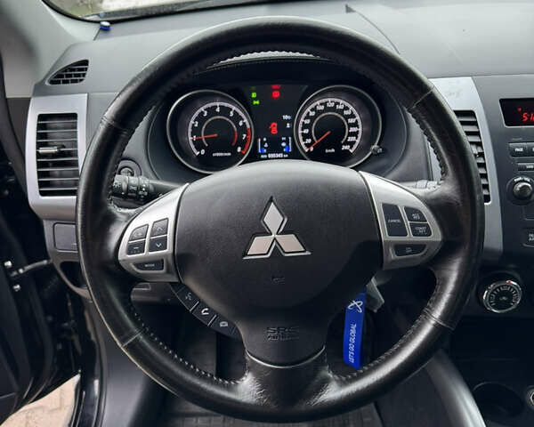 Чорний Міцубісі Аутлендер, об'ємом двигуна 2.36 л та пробігом 96 тис. км за 11700 $, фото 17 на Automoto.ua
