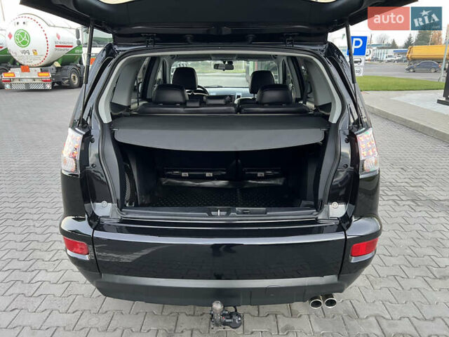 Чорний Міцубісі Аутлендер, об'ємом двигуна 2.3 л та пробігом 124 тис. км за 11999 $, фото 86 на Automoto.ua