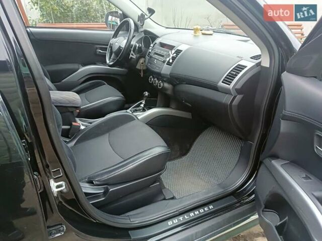 Черный Мицубиси Аутлендер, объемом двигателя 2.2 л и пробегом 218 тыс. км за 11500 $, фото 11 на Automoto.ua