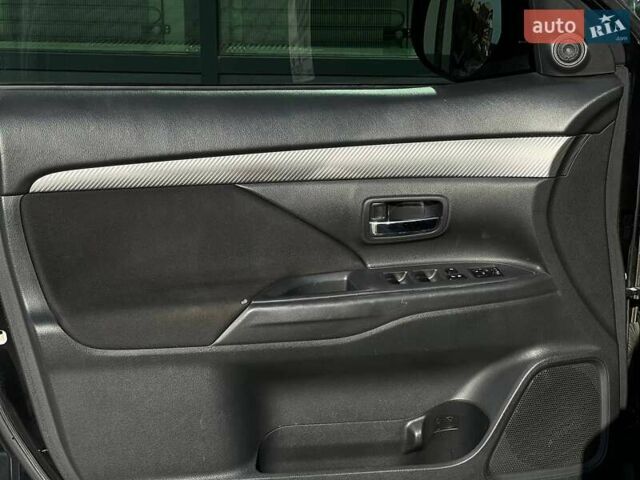 Черный Мицубиси Аутлендер, объемом двигателя 2.36 л и пробегом 212 тыс. км за 11490 $, фото 19 на Automoto.ua