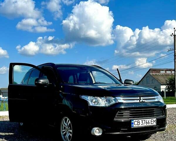 Чорний Міцубісі Аутлендер, об'ємом двигуна 2.27 л та пробігом 250 тис. км за 12200 $, фото 11 на Automoto.ua