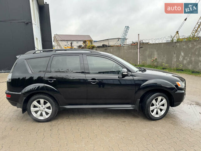 Чорний Міцубісі Аутлендер, об'ємом двигуна 2.36 л та пробігом 96 тис. км за 11700 $, фото 1 на Automoto.ua