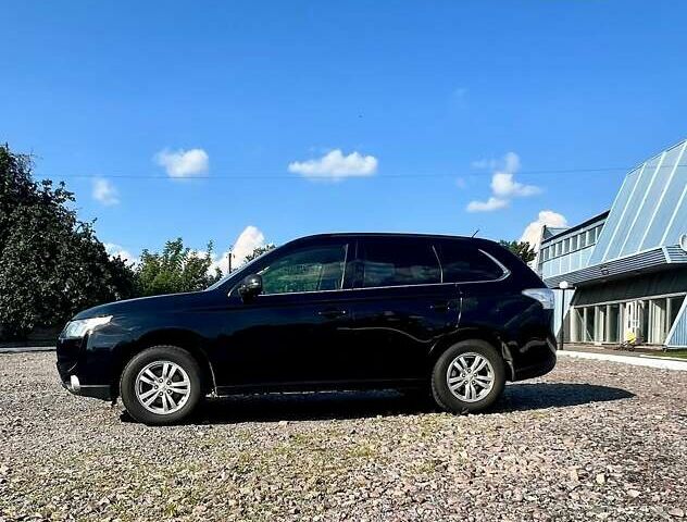 Чорний Міцубісі Аутлендер, об'ємом двигуна 2.27 л та пробігом 250 тис. км за 12200 $, фото 1 на Automoto.ua