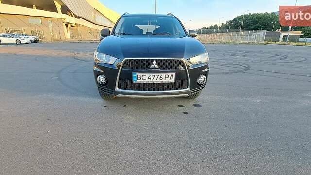 Черный Мицубиси Аутлендер, объемом двигателя 2.36 л и пробегом 285 тыс. км за 11300 $, фото 26 на Automoto.ua