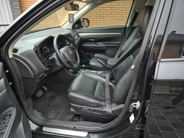 Черный Мицубиси Аутлендер, объемом двигателя 2.4 л и пробегом 211 тыс. км за 12590 $, фото 13 на Automoto.ua