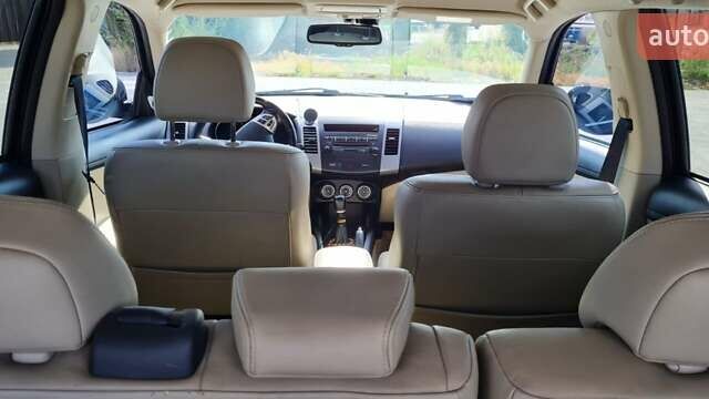 Черный Мицубиси Аутлендер, объемом двигателя 2.27 л и пробегом 195 тыс. км за 10500 $, фото 12 на Automoto.ua