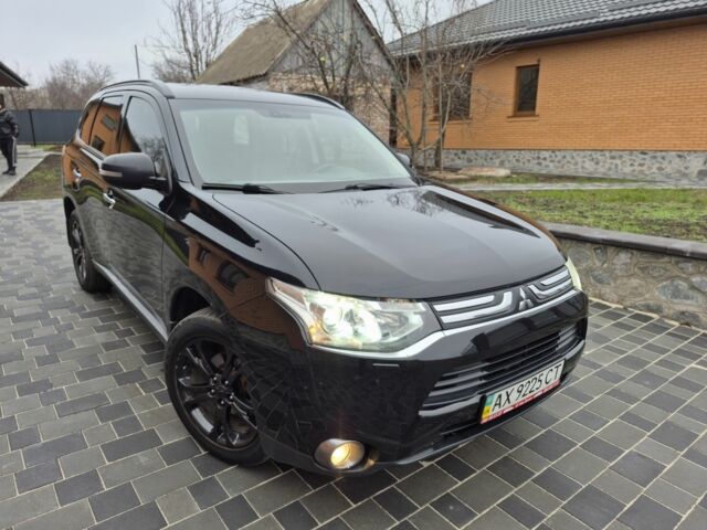 Черный Мицубиси Аутлендер, объемом двигателя 2.4 л и пробегом 211 тыс. км за 12590 $, фото 6 на Automoto.ua