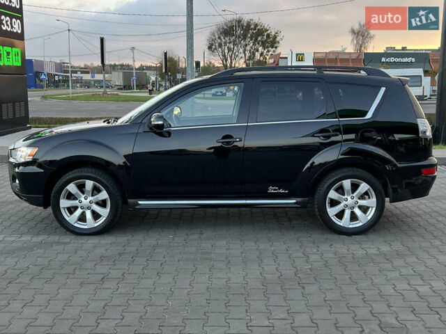 Чорний Міцубісі Аутлендер, об'ємом двигуна 2.3 л та пробігом 124 тис. км за 11999 $, фото 7 на Automoto.ua