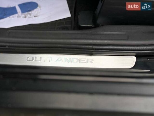 Черный Мицубиси Аутлендер, объемом двигателя 2.36 л и пробегом 212 тыс. км за 12990 $, фото 19 на Automoto.ua