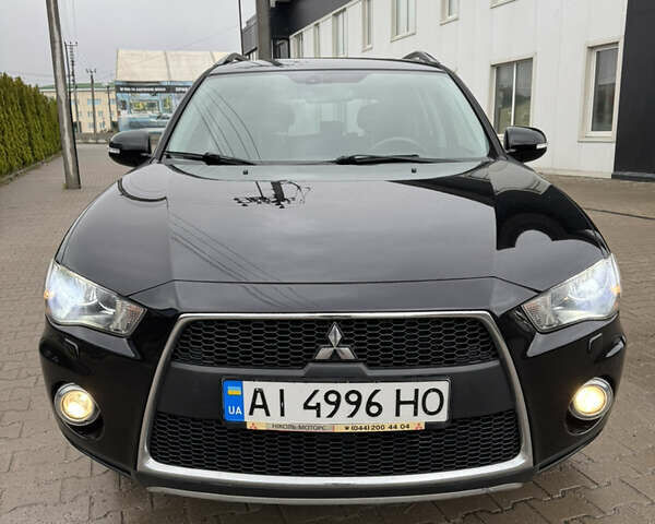 Чорний Міцубісі Аутлендер, об'ємом двигуна 2.36 л та пробігом 96 тис. км за 11700 $, фото 7 на Automoto.ua
