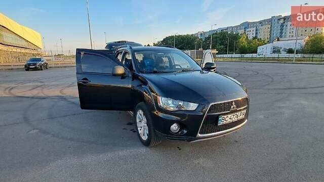 Черный Мицубиси Аутлендер, объемом двигателя 2.36 л и пробегом 285 тыс. км за 11300 $, фото 37 на Automoto.ua