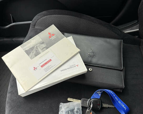 Чорний Міцубісі Аутлендер, об'ємом двигуна 2.36 л та пробігом 96 тис. км за 11700 $, фото 41 на Automoto.ua