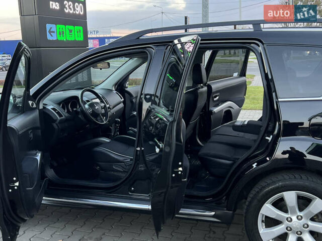 Чорний Міцубісі Аутлендер, об'ємом двигуна 2.3 л та пробігом 124 тис. км за 11999 $, фото 32 на Automoto.ua