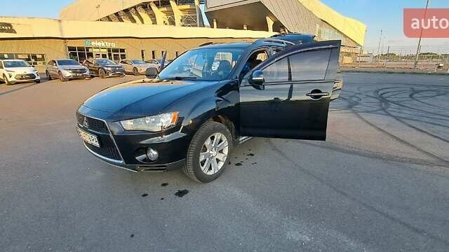 Черный Мицубиси Аутлендер, объемом двигателя 2.36 л и пробегом 285 тыс. км за 11300 $, фото 30 на Automoto.ua