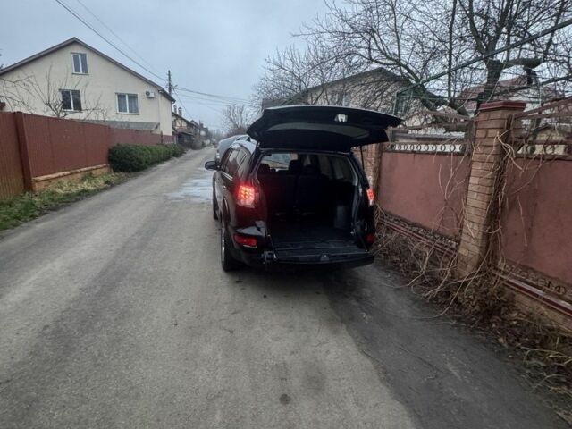 Черный Мицубиси Аутлендер, объемом двигателя 2.4 л и пробегом 136 тыс. км за 14500 $, фото 6 на Automoto.ua