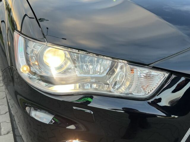 Черный Мицубиси Аутлендер, объемом двигателя 2.3 л и пробегом 124 тыс. км за 11999 $, фото 5 на Automoto.ua