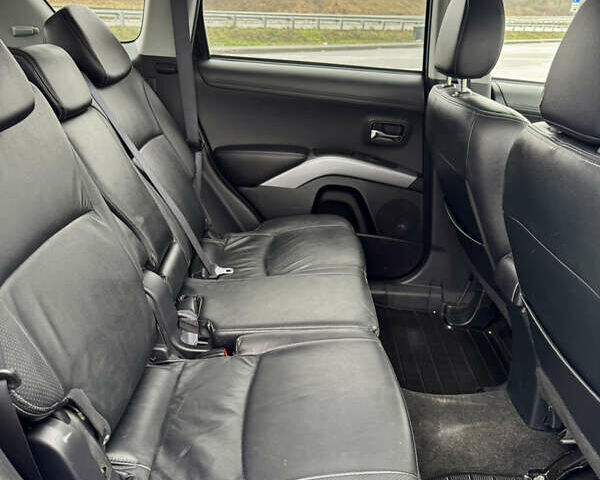 Черный Мицубиси Аутлендер, объемом двигателя 2.2 л и пробегом 215 тыс. км за 11450 $, фото 31 на Automoto.ua