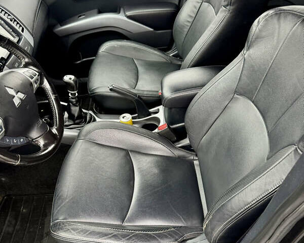 Черный Мицубиси Аутлендер, объемом двигателя 2.2 л и пробегом 215 тыс. км за 11450 $, фото 18 на Automoto.ua