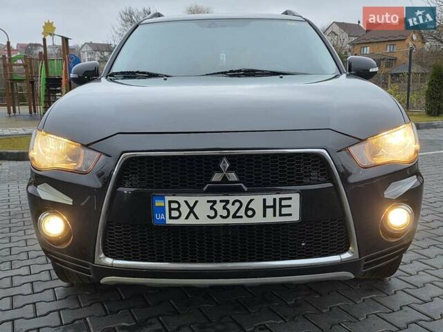 Черный Мицубиси Аутлендер, объемом двигателя 2.2 л и пробегом 188 тыс. км за 10999 $, фото 4 на Automoto.ua