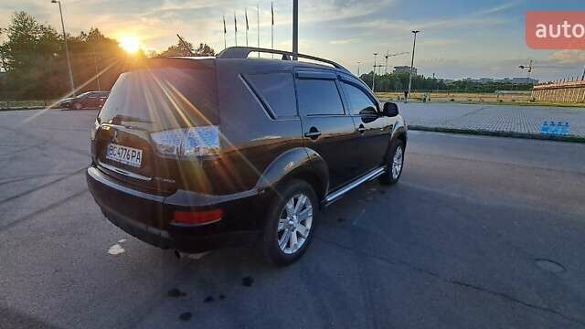 Черный Мицубиси Аутлендер, объемом двигателя 2.36 л и пробегом 285 тыс. км за 11300 $, фото 21 на Automoto.ua