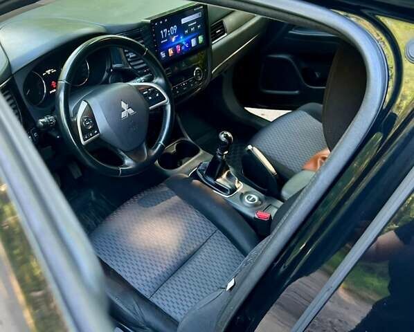 Чорний Міцубісі Аутлендер, об'ємом двигуна 2.27 л та пробігом 250 тис. км за 12200 $, фото 23 на Automoto.ua