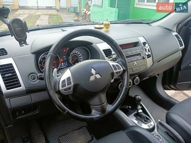 Черный Мицубиси Аутлендер, объемом двигателя 2.2 л и пробегом 218 тыс. км за 11500 $, фото 19 на Automoto.ua