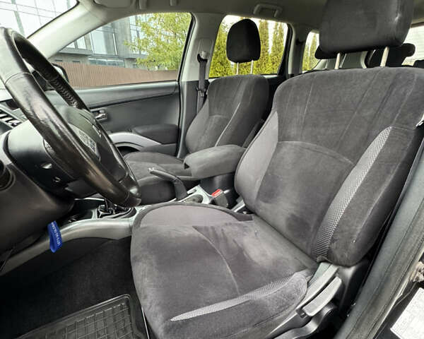 Чорний Міцубісі Аутлендер, об'ємом двигуна 2.36 л та пробігом 96 тис. км за 11700 $, фото 16 на Automoto.ua