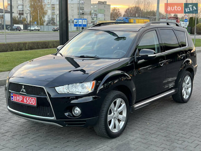 Чорний Міцубісі Аутлендер, об'ємом двигуна 2.3 л та пробігом 124 тис. км за 11999 $, фото 107 на Automoto.ua