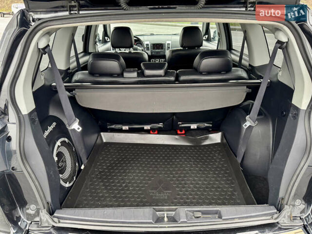 Черный Мицубиси Аутлендер, объемом двигателя 2.2 л и пробегом 215 тыс. км за 11450 $, фото 32 на Automoto.ua