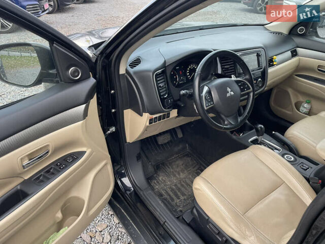 Чорний Міцубісі Аутлендер, об'ємом двигуна 2.27 л та пробігом 203 тис. км за 12600 $, фото 8 на Automoto.ua