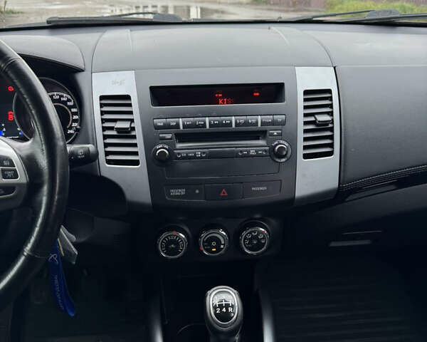 Чорний Міцубісі Аутлендер, об'ємом двигуна 2.36 л та пробігом 96 тис. км за 11700 $, фото 32 на Automoto.ua