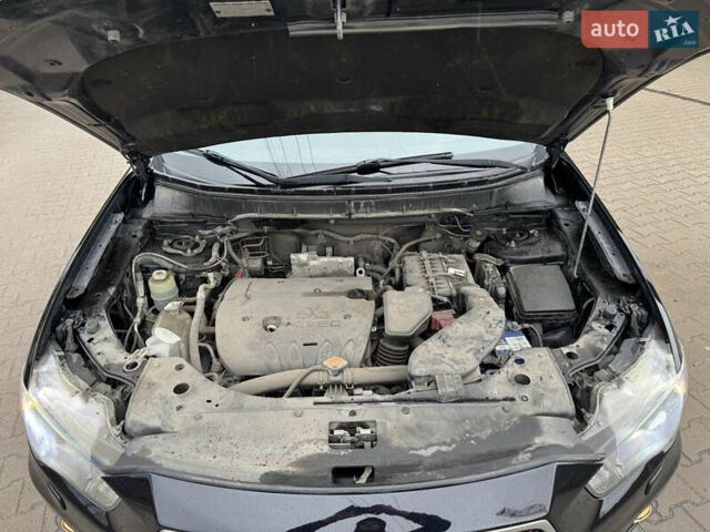 Чорний Міцубісі Аутлендер, об'ємом двигуна 2.36 л та пробігом 96 тис. км за 11700 $, фото 37 на Automoto.ua