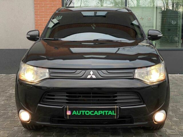 Черный Мицубиси Аутлендер, объемом двигателя 2.4 л и пробегом 212 тыс. км за 12990 $, фото 2 на Automoto.ua