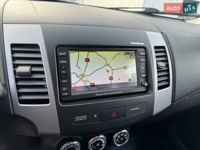 Мицубиси Аутлендер 2012 в Полтаве на Automoto.ua Черный Мицубиси Аутлендер, объемом двигателя 2.3 л и пробегом 194 тыс. км за 11450 $, фото 20 на Automoto.ua