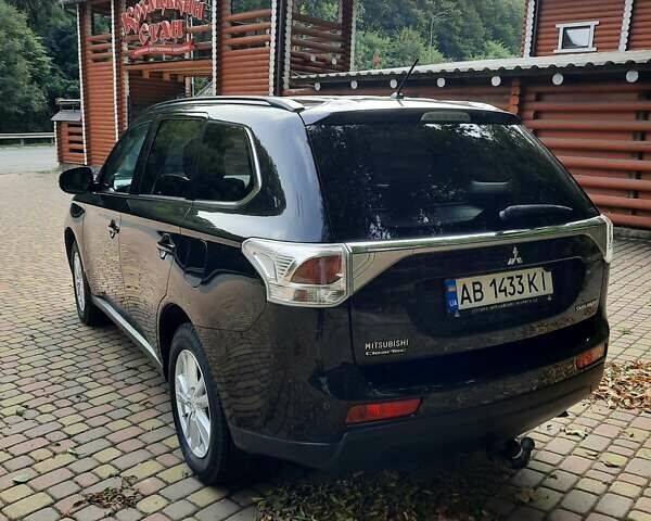 Черный Мицубиси Аутлендер, объемом двигателя 2.27 л и пробегом 256 тыс. км за 13600 $, фото 2 на Automoto.ua