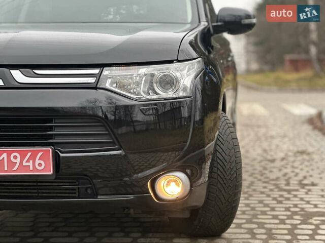 Чорний Міцубісі Аутлендер, об'ємом двигуна 2.2 л та пробігом 176 тис. км за 13500 $, фото 3 на Automoto.ua